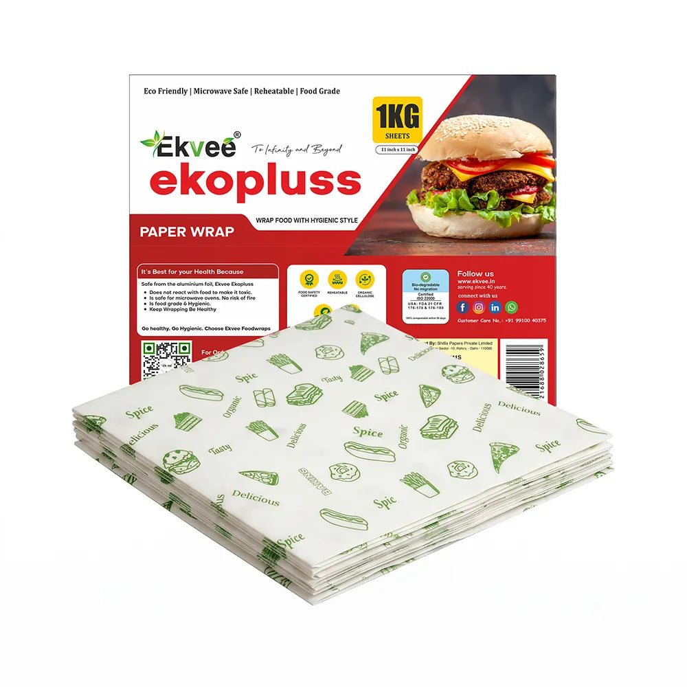 Ekvee Ekopluss paper wrap, 1 kg pack of 11 × 11-inch food-grade sheets, with green food-themed prints and a red-and-white product package in the background.