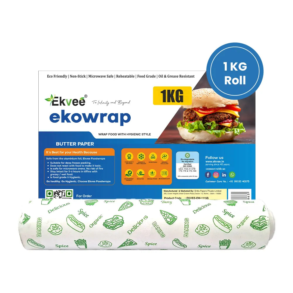 Ekvee Ekowrap Butter Paper 1KG roll packaging with a sample roll of white paper printed with green food-themed illustrations, on a white background.