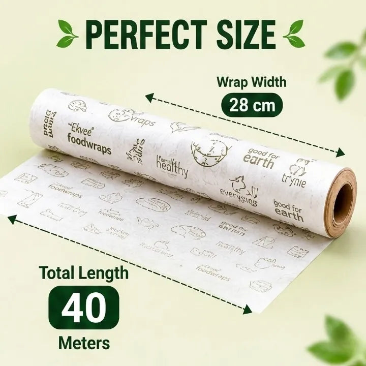 A roll of reusable foodwraps shown on a light beige background with printed text indicating perfect size, 28 cm wrap width, and 40 meters total length. The wraps are white with brown printed illustrations and phrases like 'healthy' and 'good for earth.