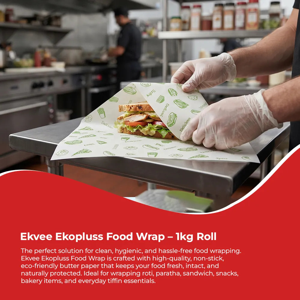 A person wearing clear disposable gloves wraps a sandwich in Ekvee Ekopluss Food Wrap paper on a stainless steel counter in a commercial kitchen. A red text banner at the bottom describes the Ekkee Ekopluss Food Wrap 1kg roll.